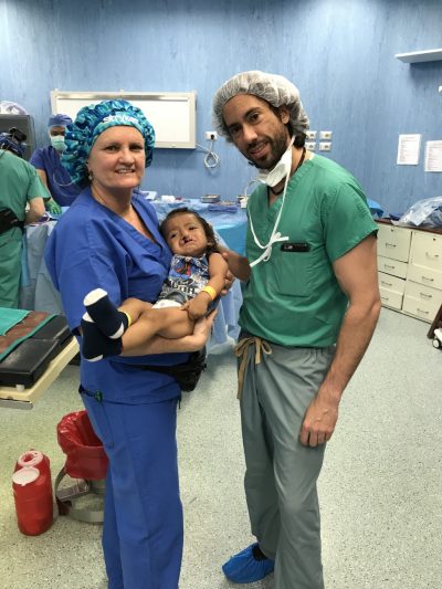 Dr Rousso on mission with his patient and other doctor